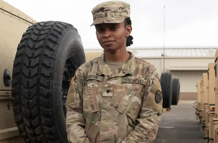 Army Reserve Soldier A female Army Reserve Soldier standing in a parking lot